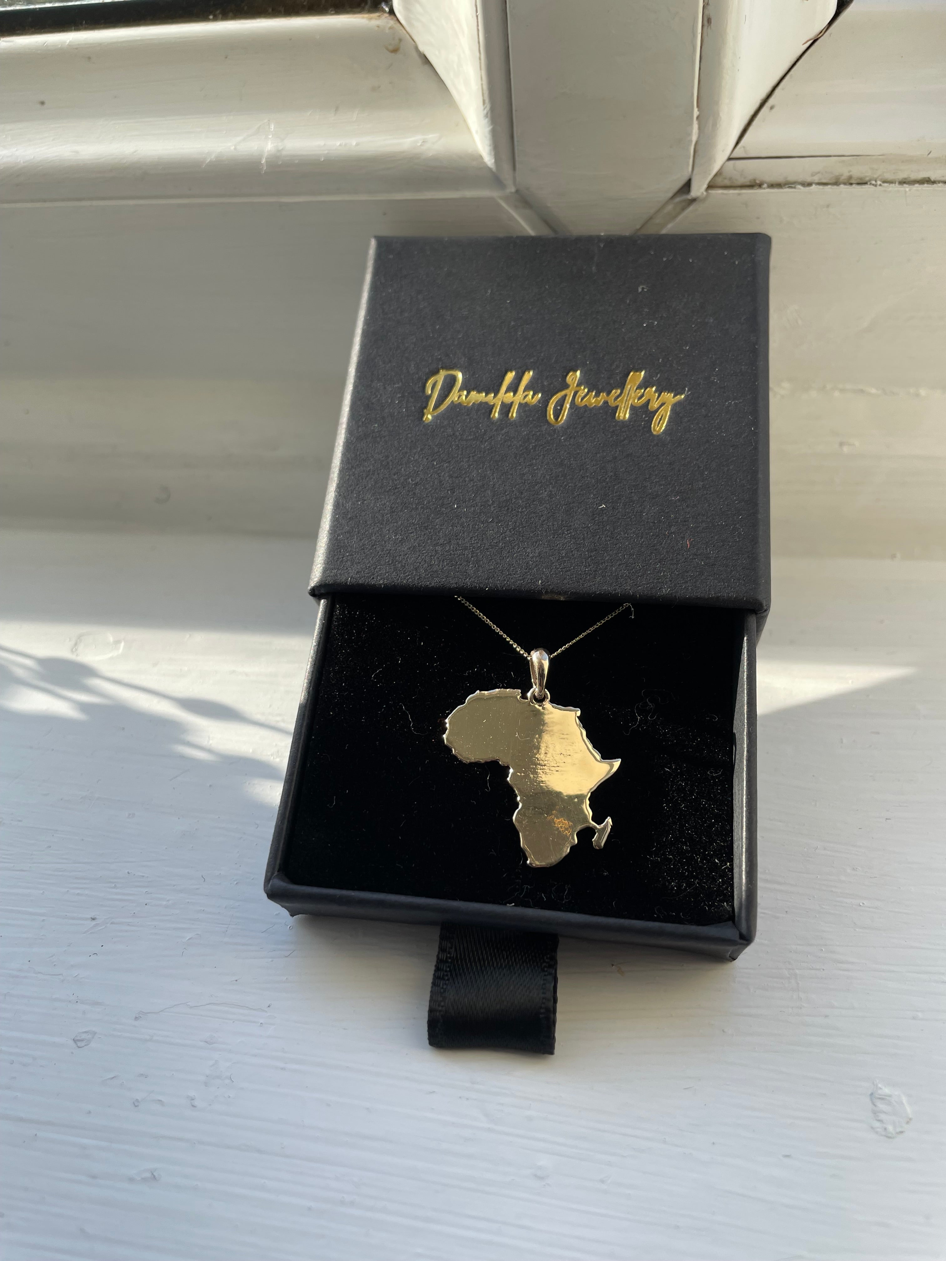 9ct Gold & 999 Silver Africa Pendant Necklace